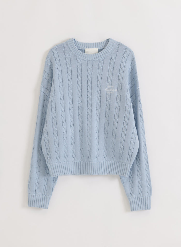 Light blue Aura Club Cable Knit Sweater from aim'n in a flatlay view, featuring classic knit patterns.
