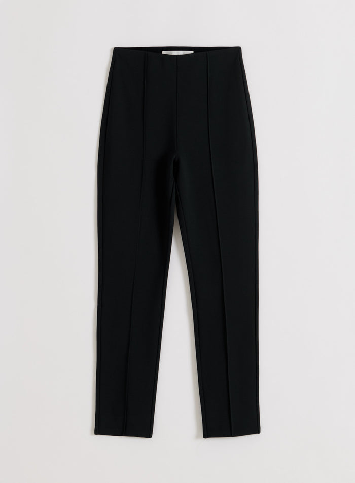 Black Luxe Pintuck pants laid flat