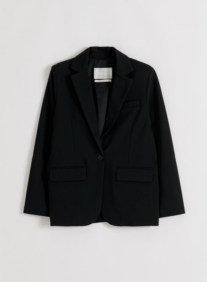 Black Luxe Relaxed Blazer from aim'n, laid flat