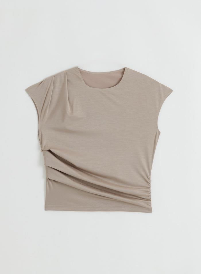 A flatlay of the Dark Clay Luminous Draped Short Sleeve top by aim'n.