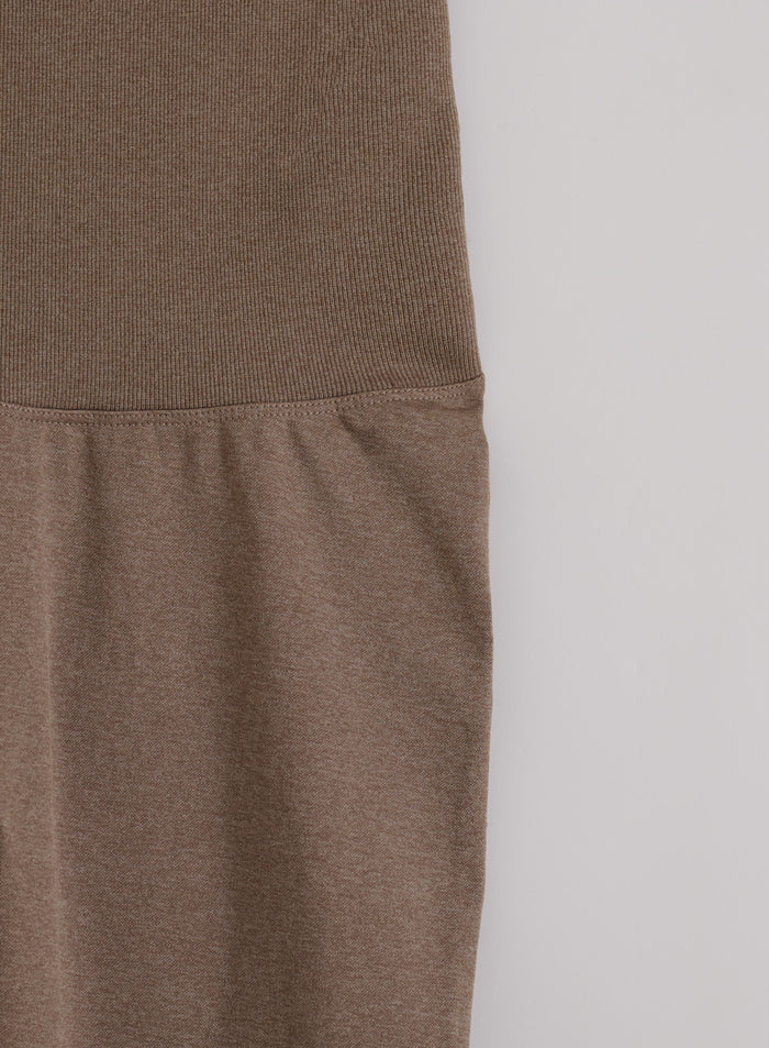 Espresso Melange brown tights featuring a high ribbed waistband and supportive seamless fabric by aim'n.