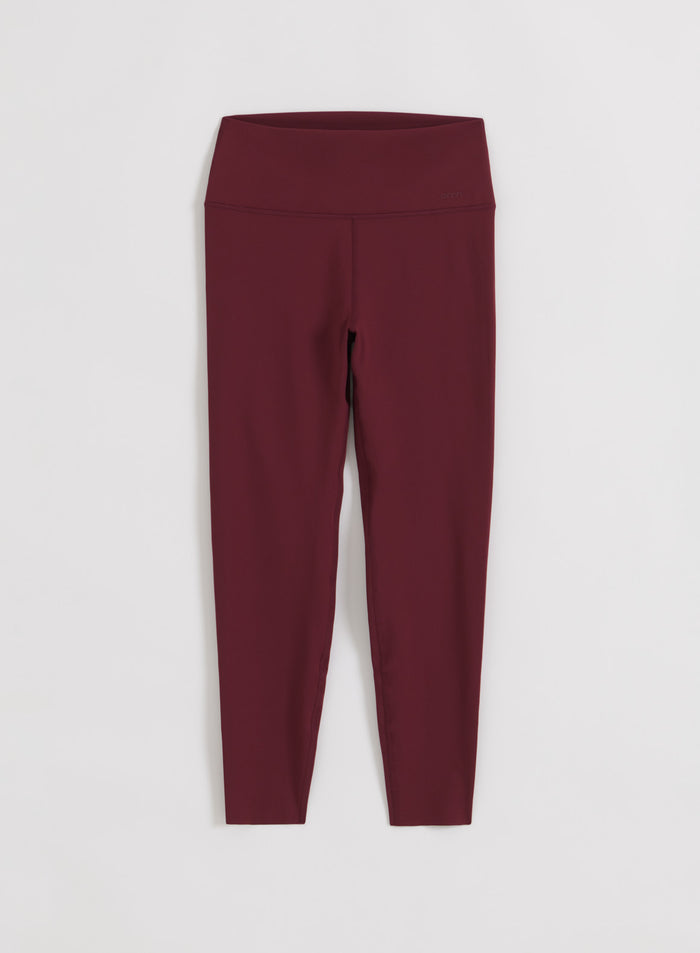 Merlot Sense Tights by aim'n in a flatlay. High-waisted, squat proof leggings with a soft second skin feel.