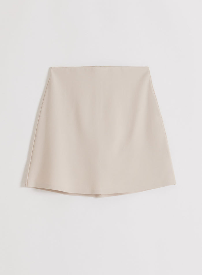 Sand Luxe Mini Skort in a flatlay view.