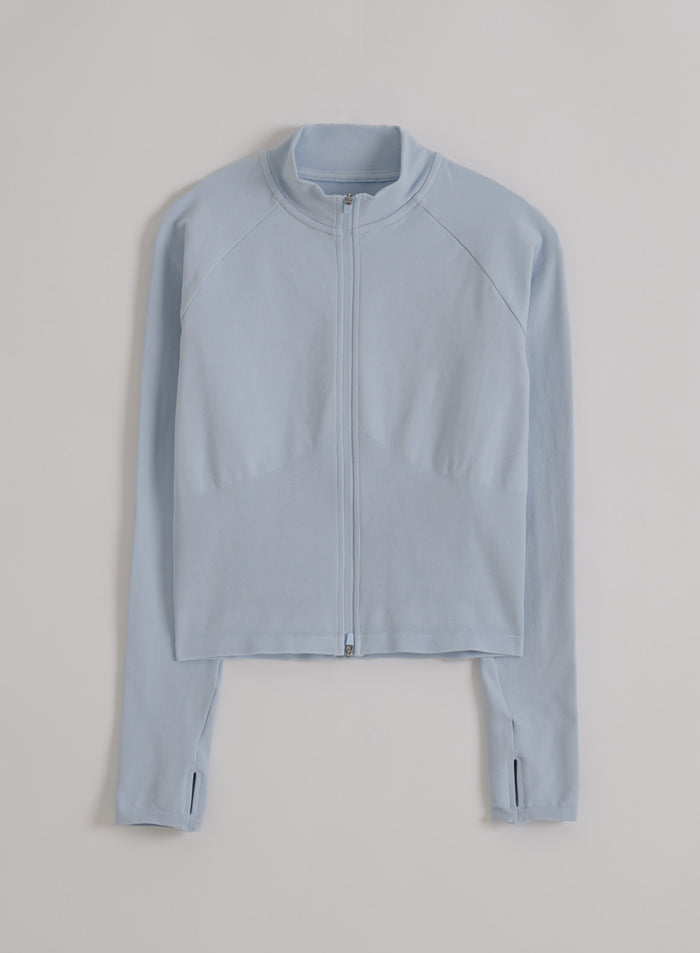 Aura light blue Shape Seamless Zip Jacket by aim'n featuring thumbholes and a full-length zip in a flatlay.