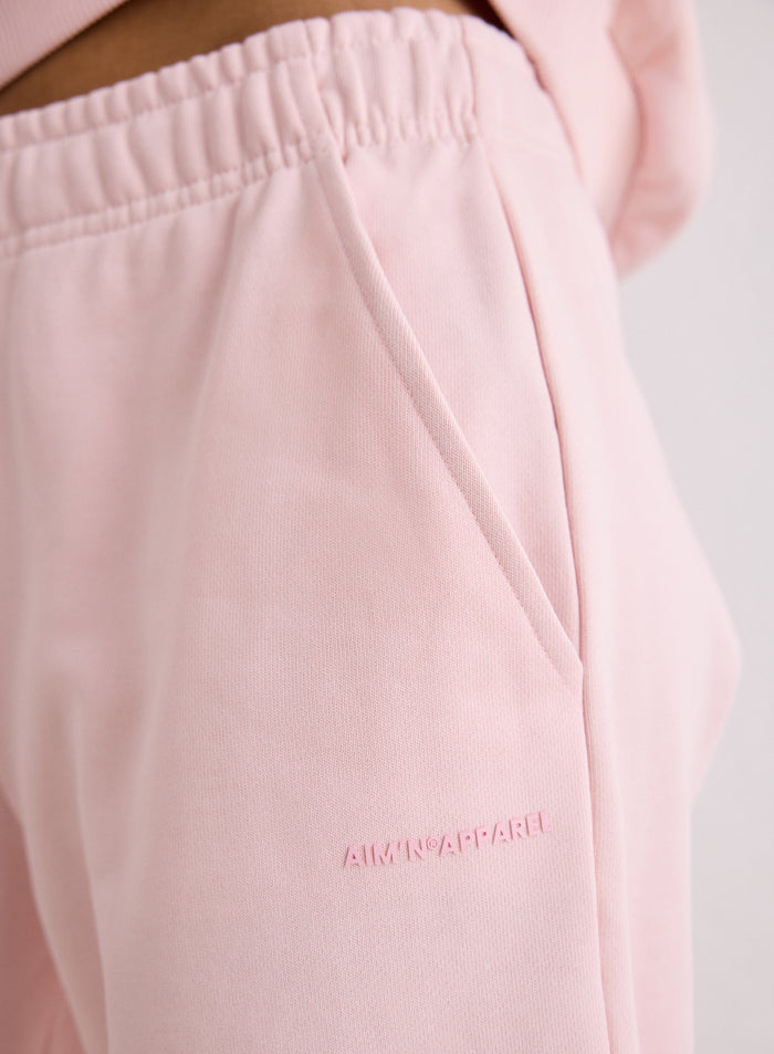 Close-up of the pocket and logo on the pink Chunky Terry Sweatpants [S-170cm]