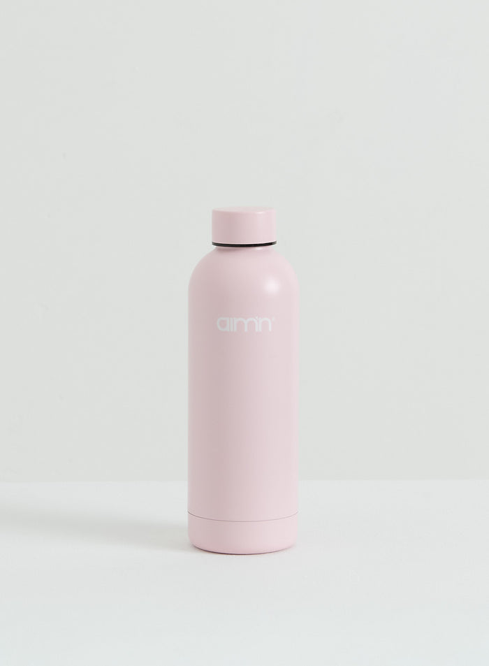 A matte pink Core Water Bottle with the aim'n logo on the front.