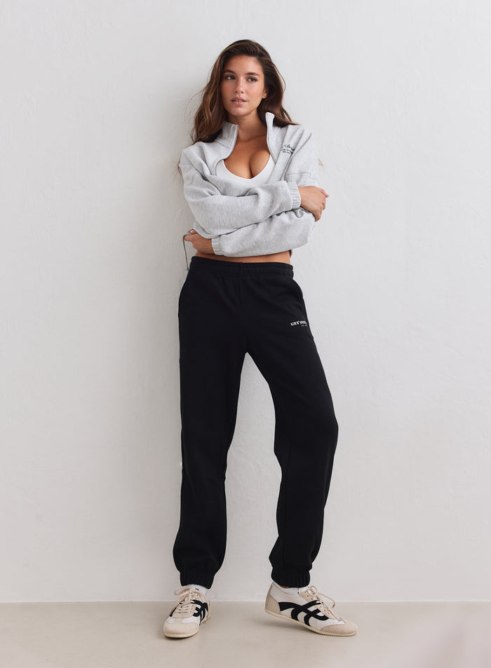 Black aim'n Classic Sweatpants made of soft brushed jersey featuring a relaxed fit and cuffed ankles. [S-163cm]