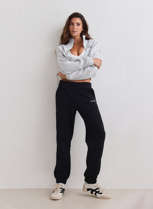 Black aim'n Classic Sweatpants made of soft brushed jersey featuring a relaxed fit and cuffed ankles. [S-163cm]