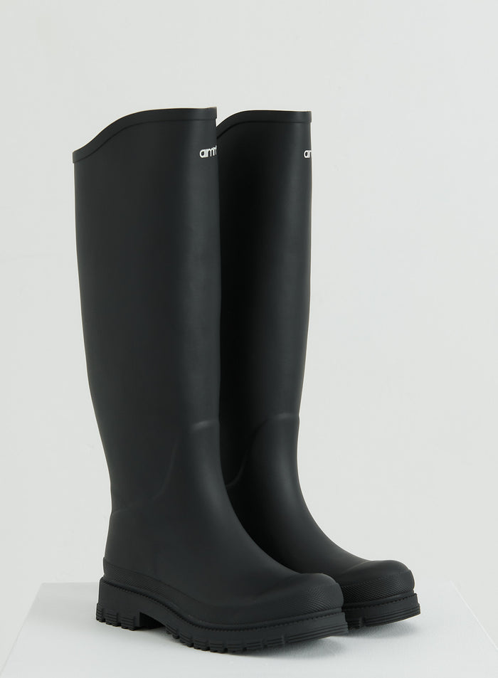 A pair of tall Black Rain Boots from aim'n