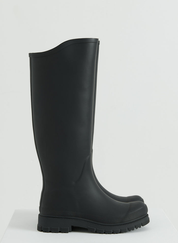 Side view of Black Rain Boots from aim'n