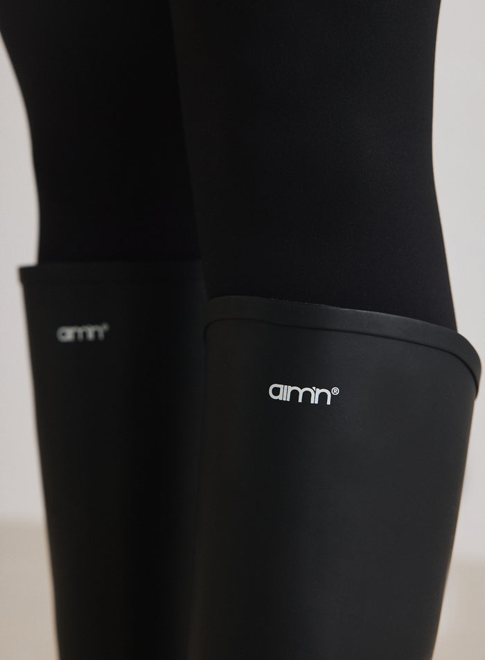 Close-up of the logo on the Black Rain Boots from aim'n