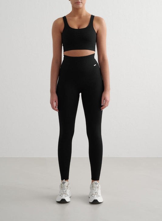 Black aim'n ribbed seamless tall tights with a high waist and second skin feel for gym and yoga.