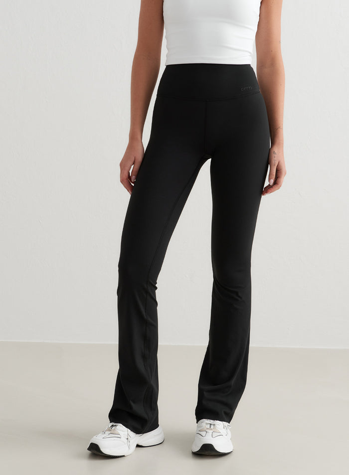 Black aim'n Sense Flare Tights featuring a high-waisted fit and flared leg, made from buttery-soft squat proof fabric.