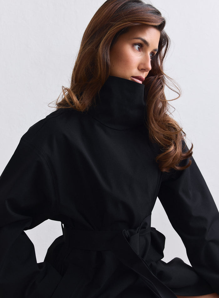 Black aim'n waterproof coat featuring a chic high collar and belted waist. [S-165cm]