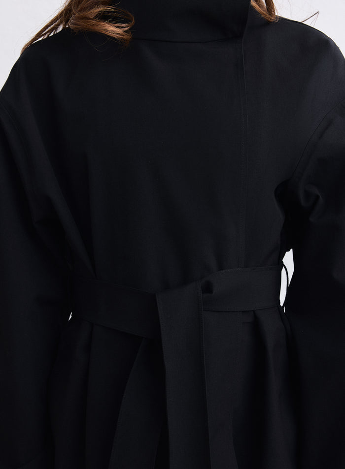 Black waterproof coat from aim'n with a woven texture and tied waist belt. [S-165cm]