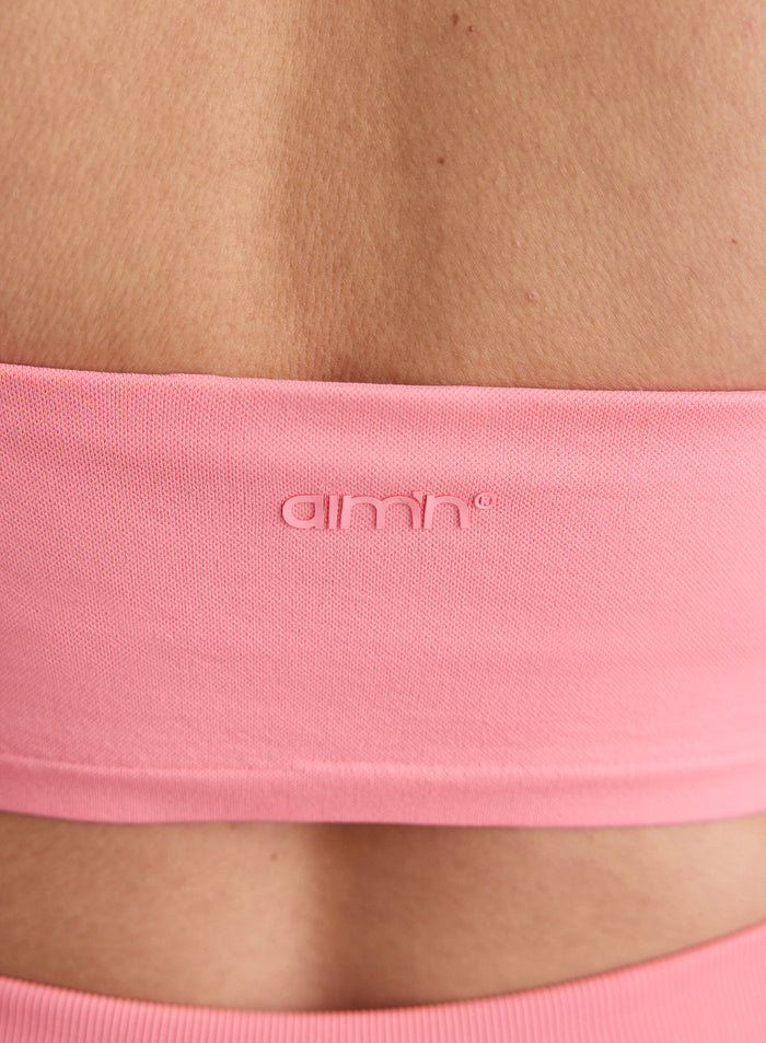 Close-up of the back of the Blush Shape Seamless Strap Bra with the aim'n logo [L-174cm]