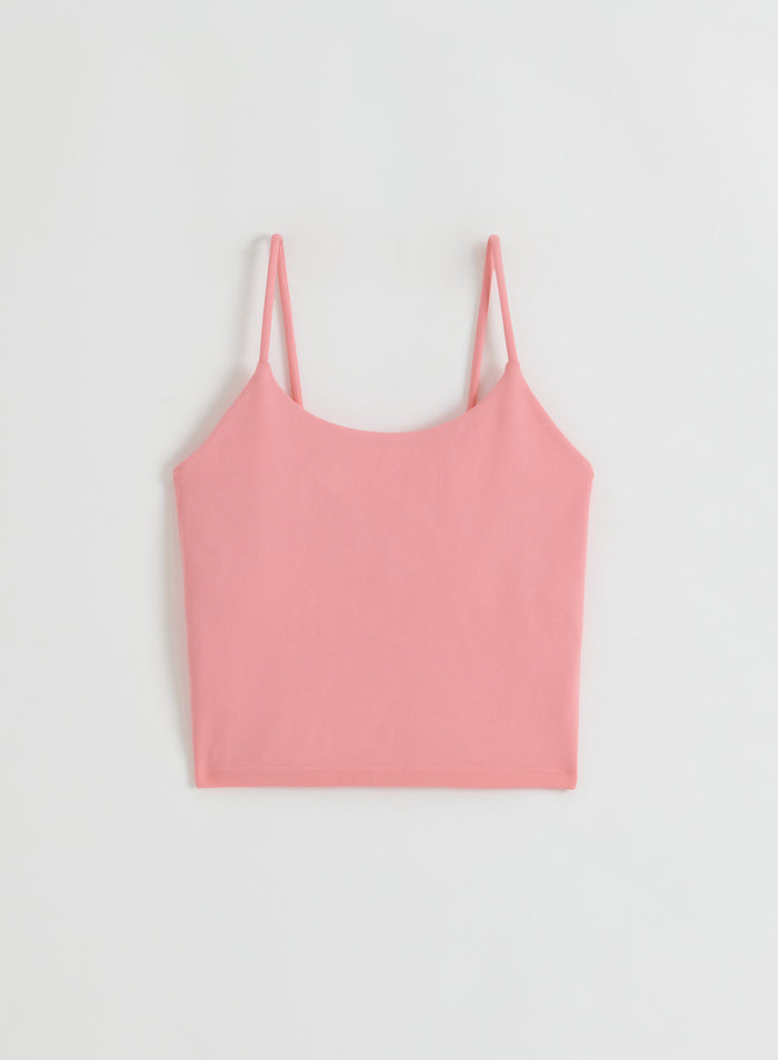 Blush Shape Seamless Strap Singlet from aim'n shown in a flatlay.