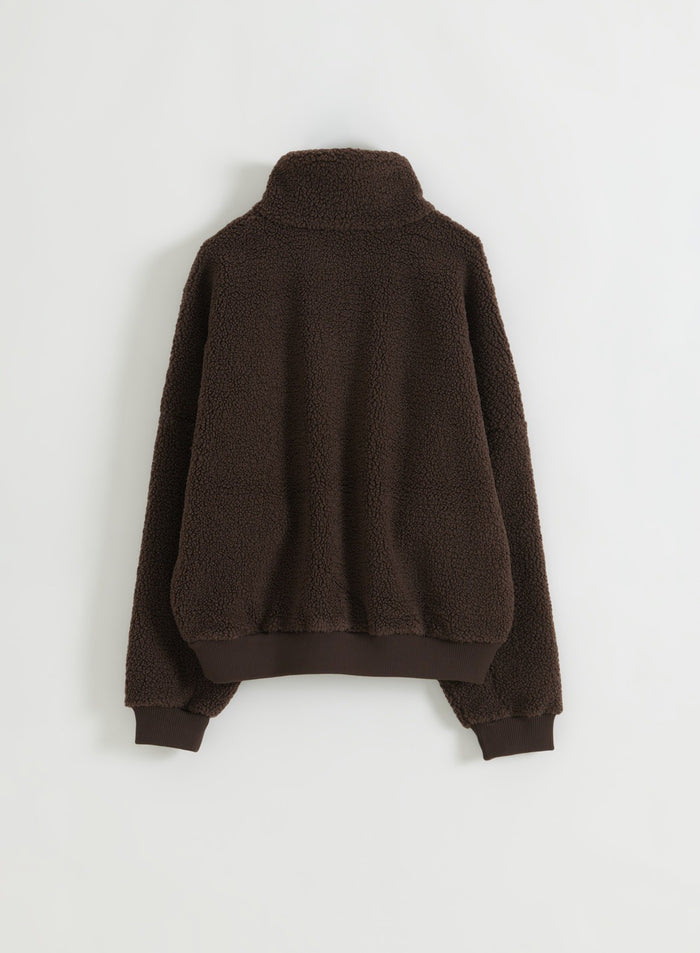 Chocolate-brown pile fleece half-zip jacket shown from the back in a flat lay