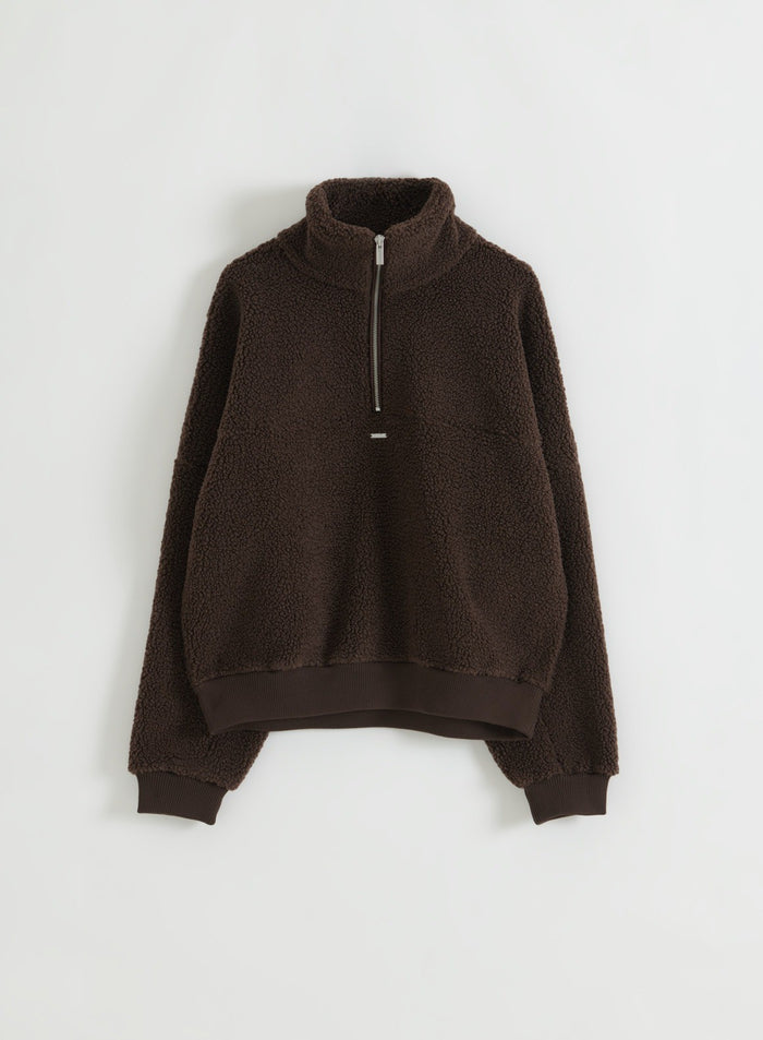Chocolate pile fleece half-zip pullover laid flat