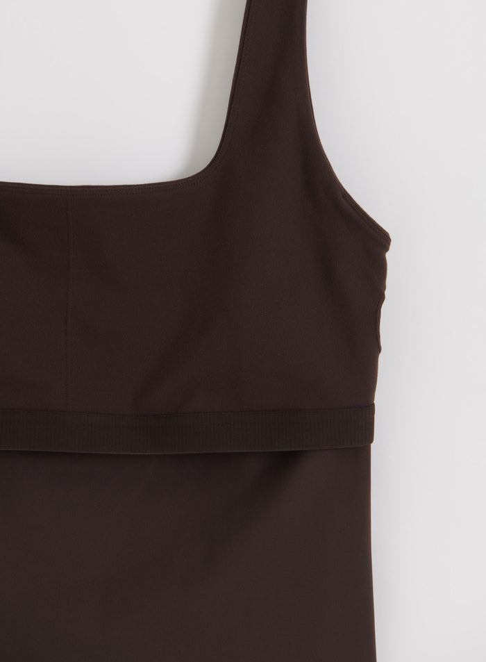Chocolate brown aim'n Sense Singlet close-up featuring wide straps and smooth, second skin fabric.