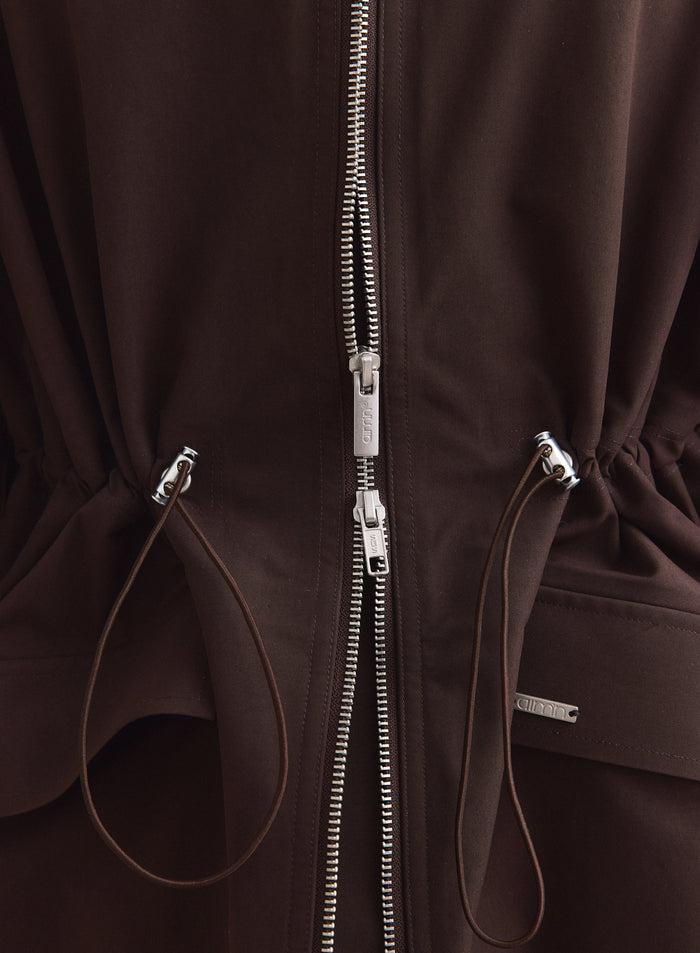 Chocolate brown aim'n jacket featuring a two-way silver zipper and adjustable cinch waist detail. [S-165cm]
