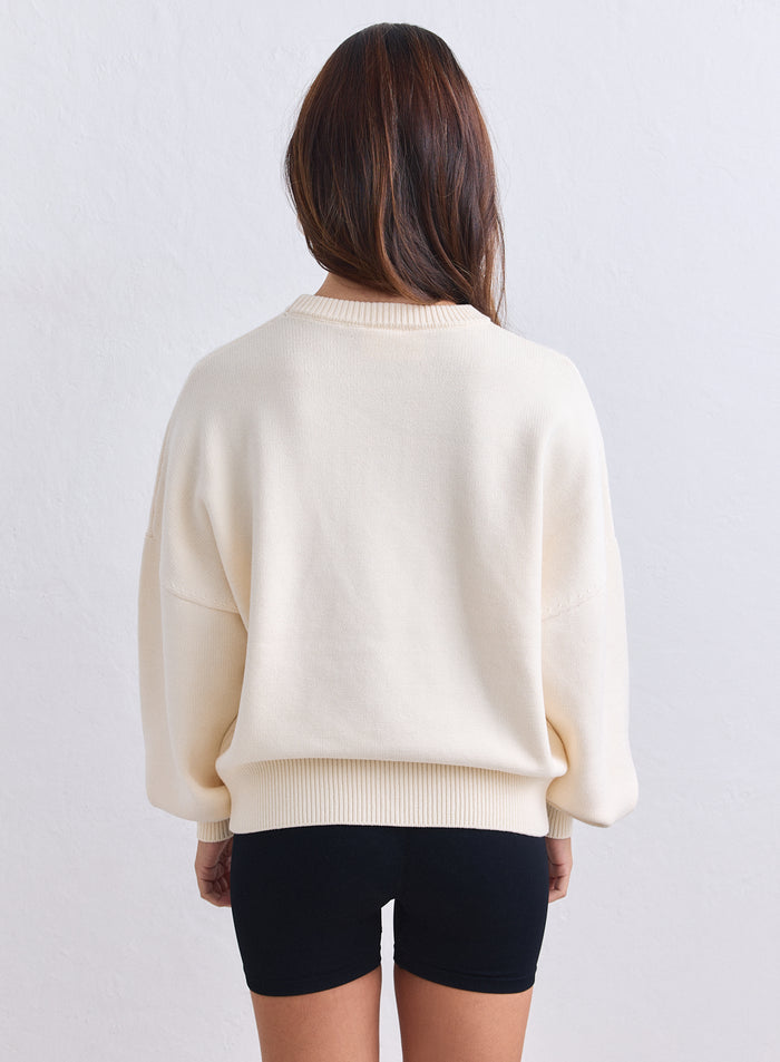 Back view of a cream athletic knit sweatshirt by aim'n with a relaxed fit. [S-165cm]