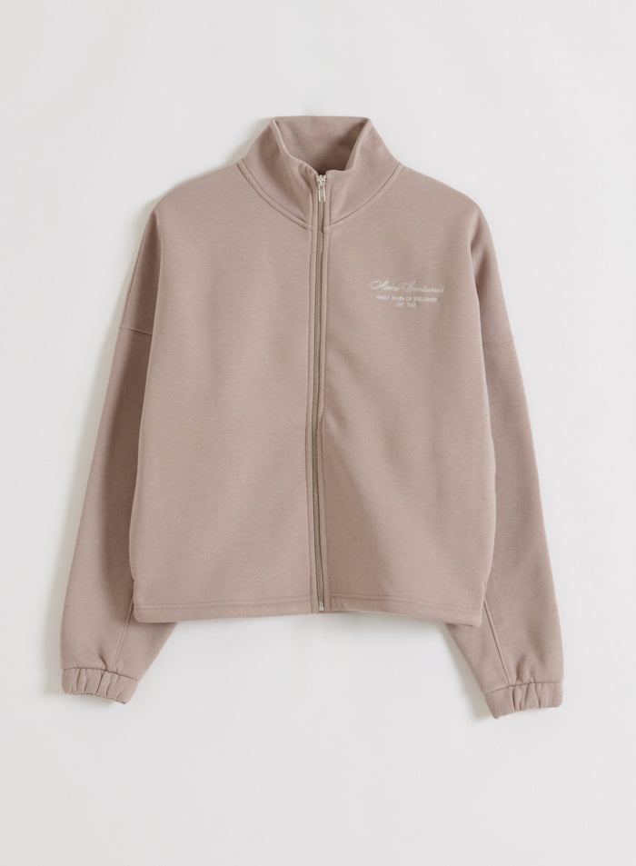 Dark clay Script Zip Jacket by aim'n featuring a high collar, full zipper, and script logo. [M-170cm]