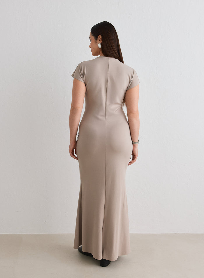 Back view of a woman wearing the Dark Clay Sense Mermaid Cap Sleeve Dress from aim'n [L-174cm]