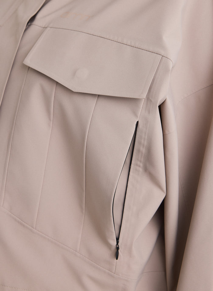 Close-up of the pocket details on the Dark Clay Waterproof Jacket [M-174cm]