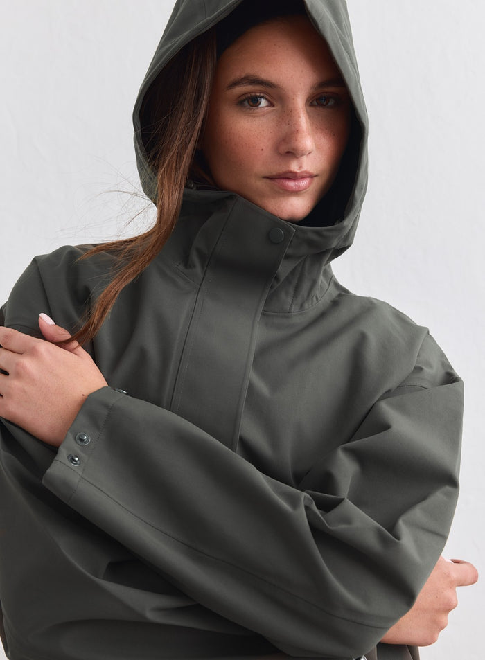 Dark Ivy Waterproof Oversized Anorak featuring a functional hood and high collar for rain protection. [M-178cm]