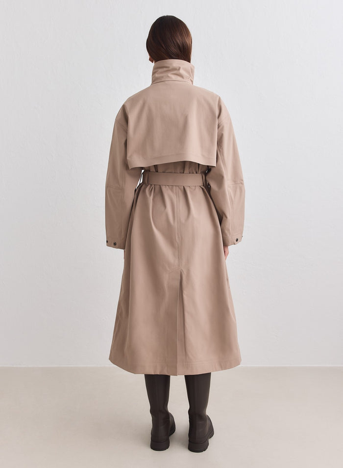 Espresso aim'n Waterproof Coat shown from the back with a ventilated yoke and waist belt. [M-178cm]