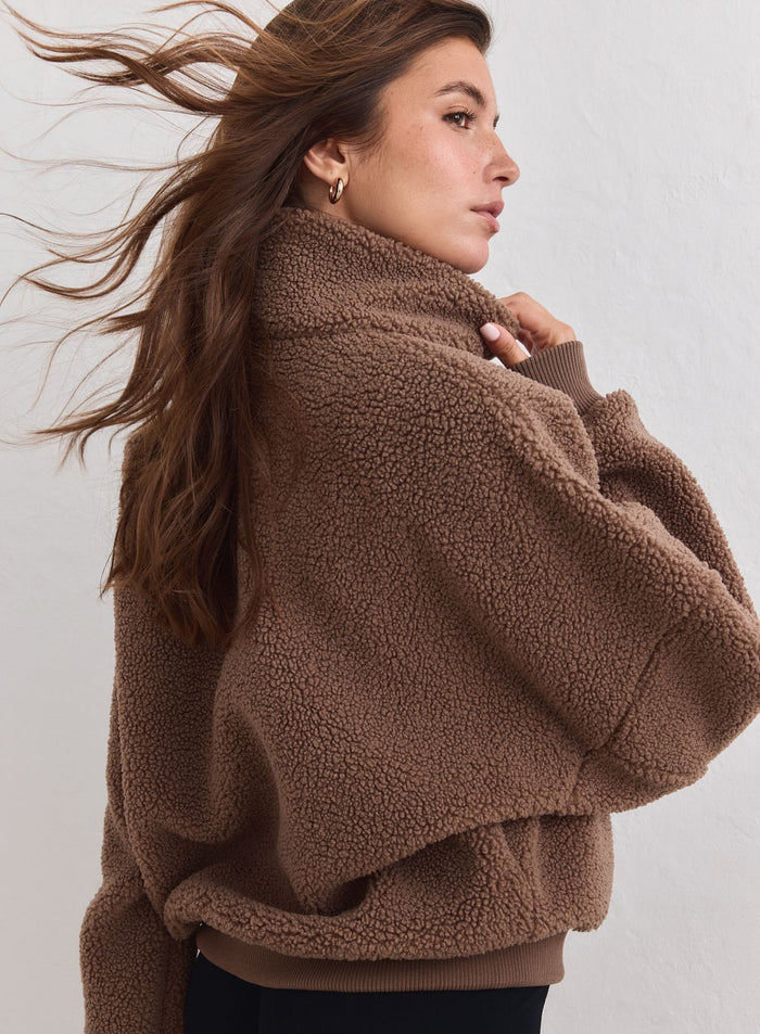 Hazelnut aim'n pile half-zip sweater with a soft, textured finish and cozy high collar. [xs-178cm]