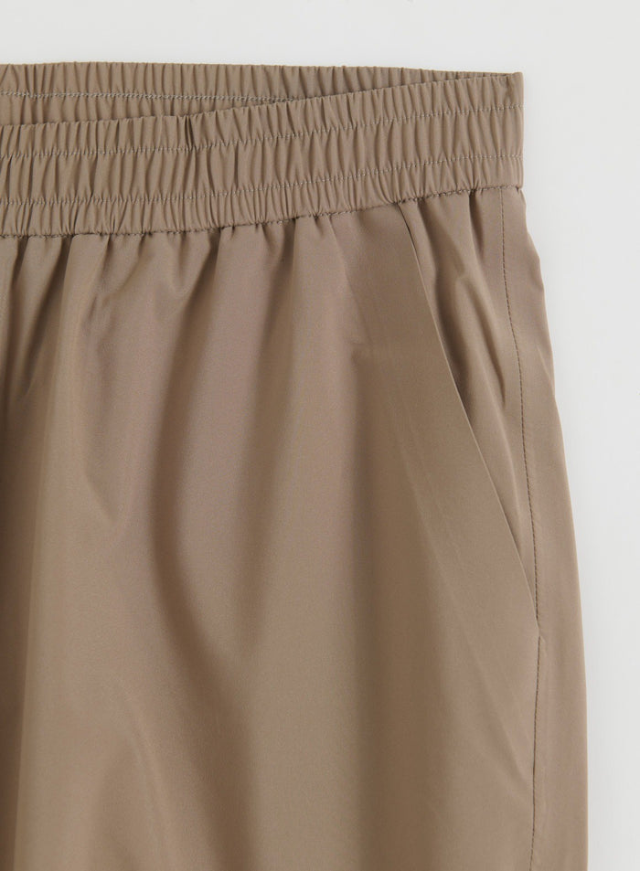 Flatlay of Hazelnut Waterproof Pants showing the waistband and pocket details