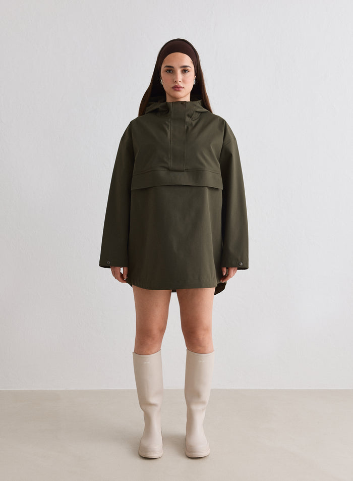 Model wearing a Khaki Waterproof Oversized Anorak from aim'n [M-174cm]