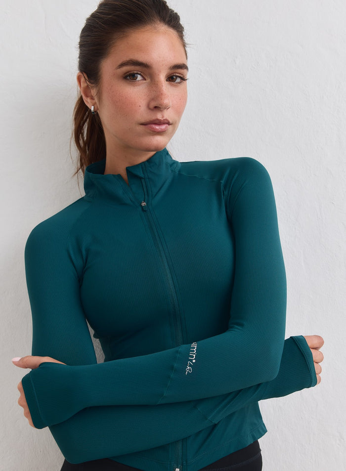 Lagoon Running Zip Long Sleeve in mesh fabric with a mock neck and half-zip detail from aim'n. [M-178cm]