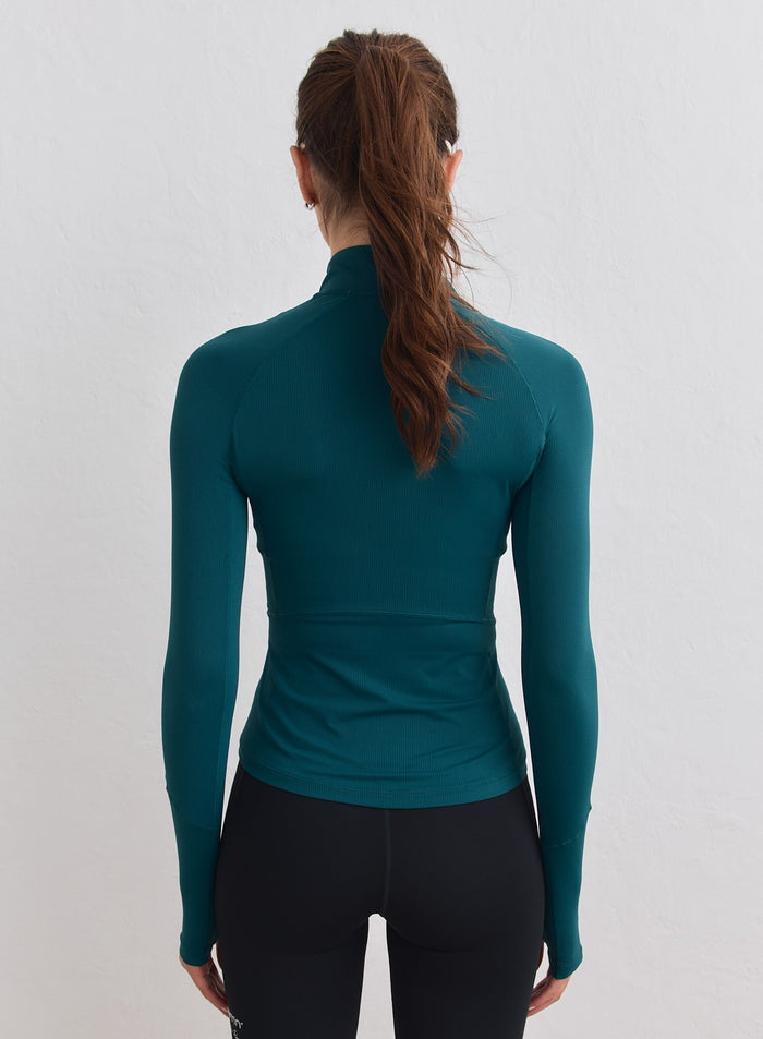 Back view of a Lagoon teal mesh Running Zip Long Sleeve by aim'n with a mock neck. [M-178cm]