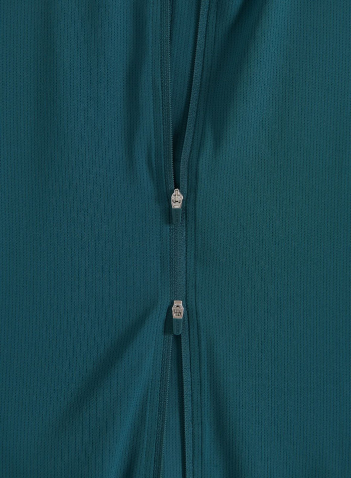 Close-up of the zipper detail on the lagoon-colored Running Zip Long Sleeve
