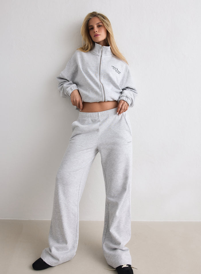 A model wearing a light grey melange Script Zip Jacket by aim'n [M-170cm]