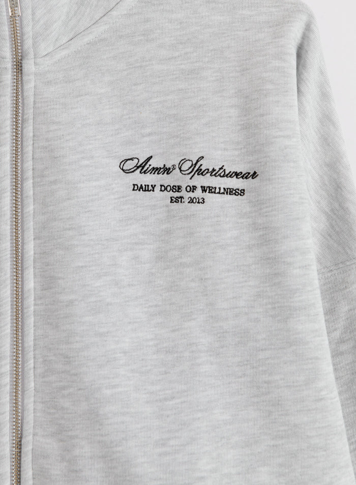 Light grey melange Script Zip Jacket featuring aim'n script print and full-length zipper.