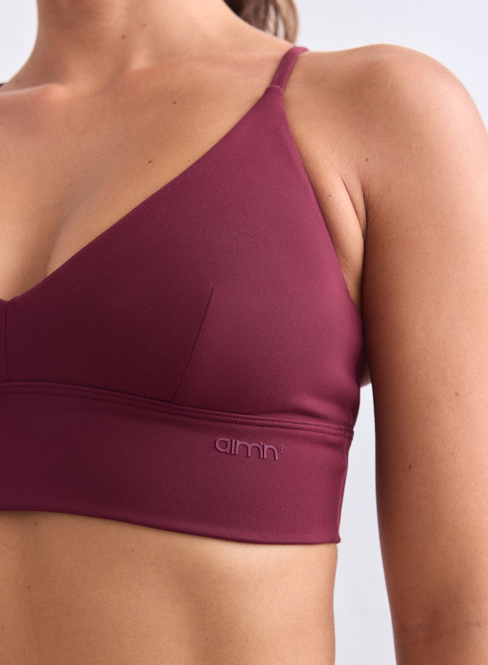 Merlot Sense Strap Bra close-up in soft fabric with aim'n logo on the wide band. [XS-165cm]