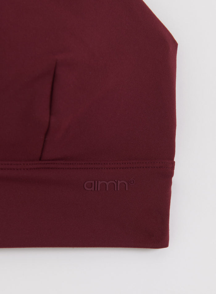 Merlot Sense Strap Bra featuring the embossed aim'n logo on the soft, second skin fabric band.