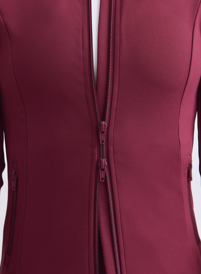 Merlot Sense Zip Jacket from aim'n featuring a two-way zipper and zipped hand pockets. [XS-165cm]
