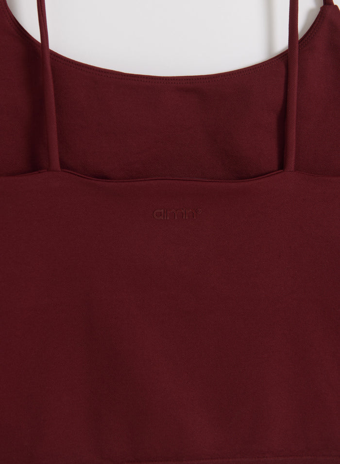 Merlot Shape Seamless Strap Singlet featuring thin straps and a subtle tone-on-tone aim'n logo on the back.