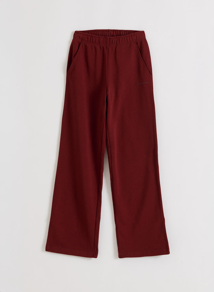 Ruby Chunky Terry Sweatpants by aim'n featuring a relaxed wide-leg fit and elastic waistband in a flatlay view.