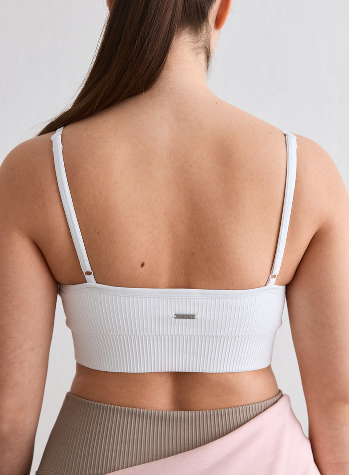 Back view of the White Ribbed Seamless Deep Cut Bra from aim'n [L-174cm]